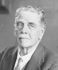 Hon. R. T. Ball, Member for Corowa, photographed in 1930. Fairfax archive, National Library of Australia (Public Domain), via Wikimedia Commons.